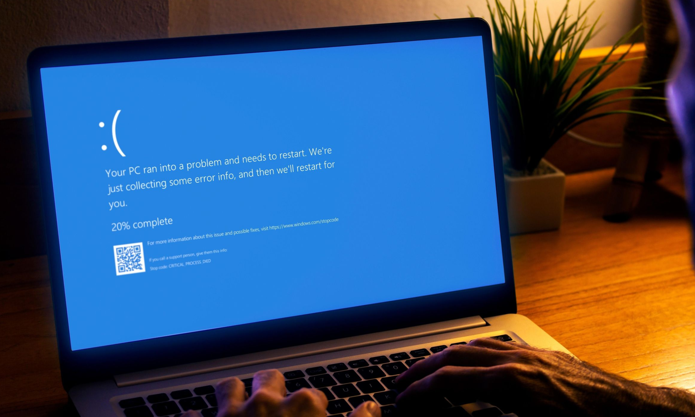 Blue Screen of Death error displayed on a Windows laptop during a system crash