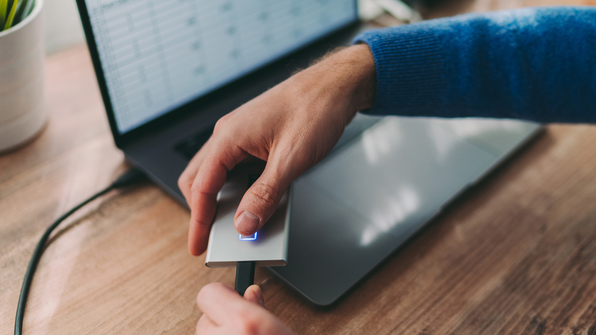 prepare computer for repair by backing up files from laptop to external drive