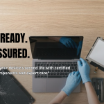 Technician replacing a cracked laptop screen at a home office